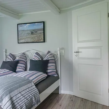 Reetdachhaus, Sauna, E-bikes, 6 Personen Casa de Férias Osterhever